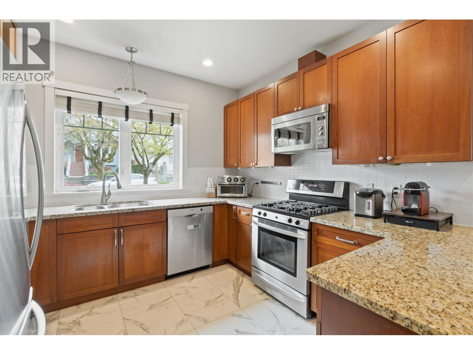 4103 Inverness Street, Vancouver, British Columbia  V5V 5C5 - Photo 1 - R3113223