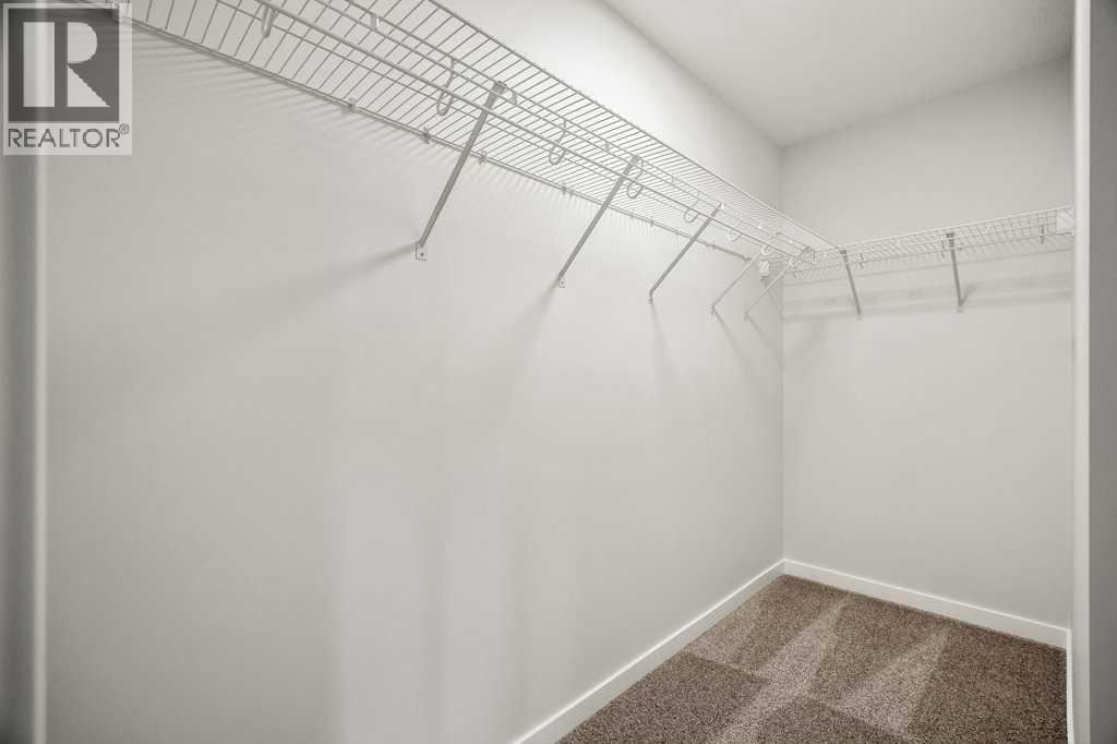 136 Wolf Hollow Manor SE, Calgary, Alberta  T2X 5R9 - Photo 32 - A2280309