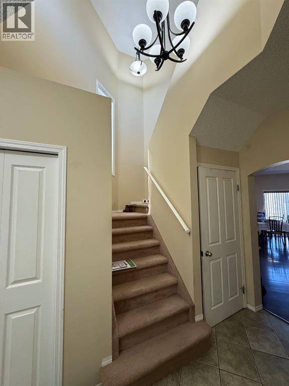 13 Tuscany Ridge Mews Nw, Calgary, Alberta  T3L 3B7 - Photo 3 - A2303363