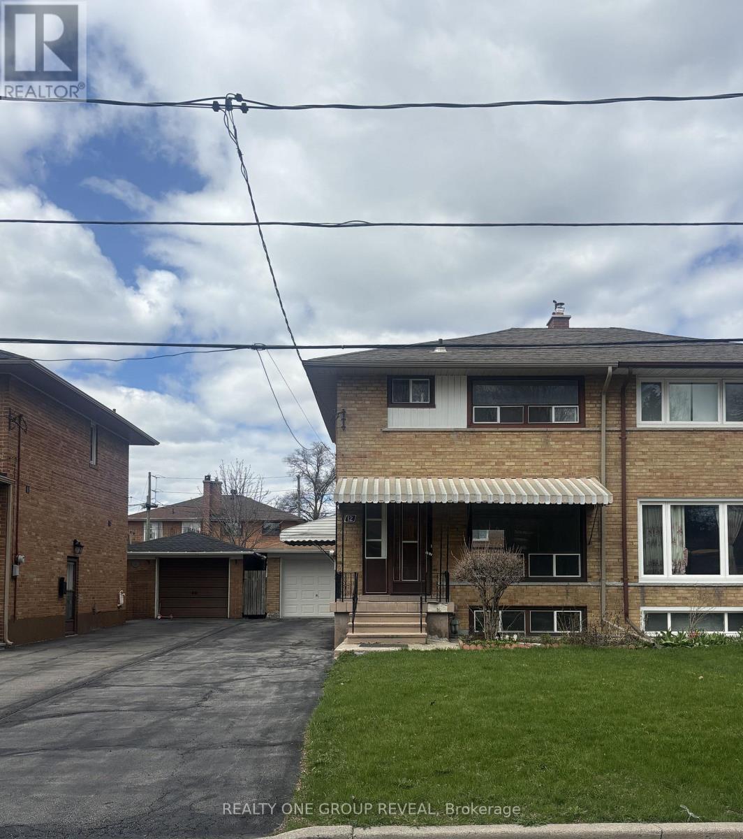 12 Thurodale Avenue, Toronto, Ontario  M6M 3B3 - Photo 1 - W12862924
