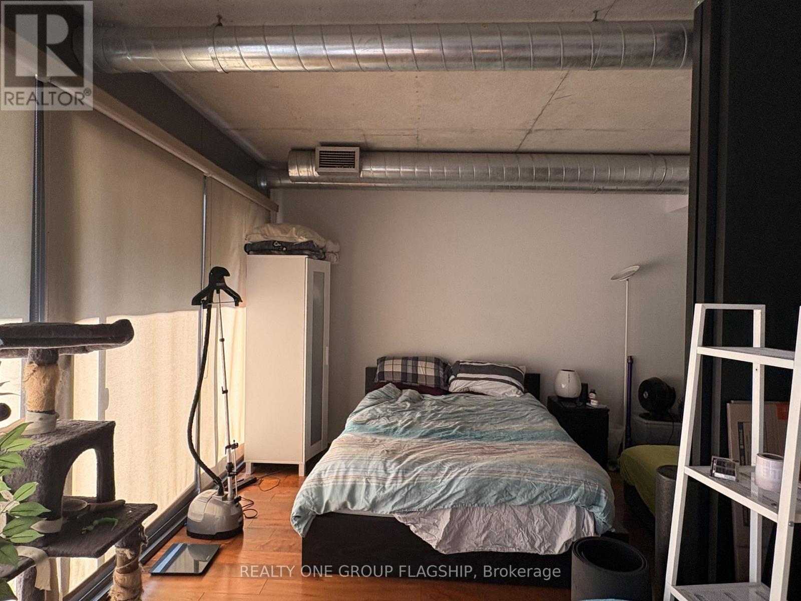 409 - 32 Trolley Crescent, Toronto, Ontario  M5A 0E8 - Photo 3 - C12972126