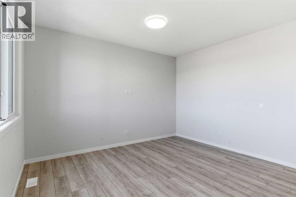 623 Buffaloberry Manor Se, Calgary, Alberta  T3M 3Z2 - Photo 12 - A2303470