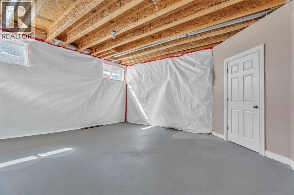 611 Cavendish Beach Bay, Chestermere, Alberta  T1X 1H9 - Photo 35 - A2303442