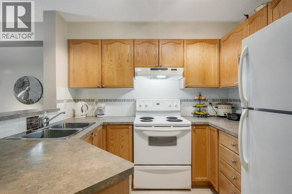 2218, 950 Arbour Lake Road Nw, Calgary, Alberta  T3G 5B3 - Photo 3 - A2300603