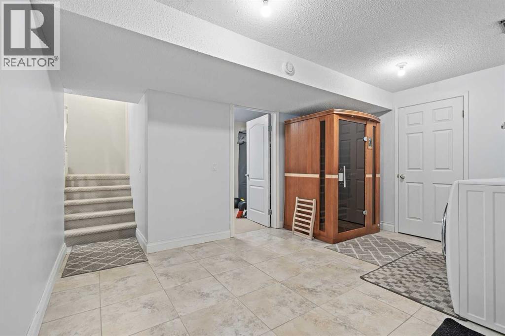 212 Coachway Lane SW, Calgary, Alberta  T3H 2V9 - Photo 28 - A2293656