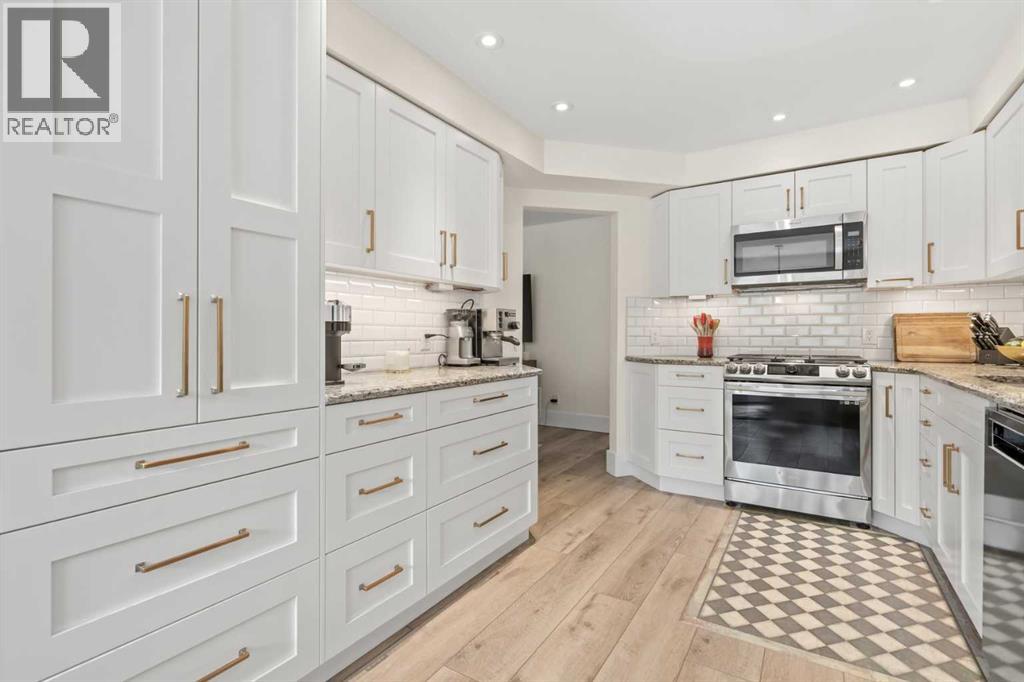 212 Coachway Lane SW, Calgary, Alberta  T3H 2V9 - Photo 2 - A2293656