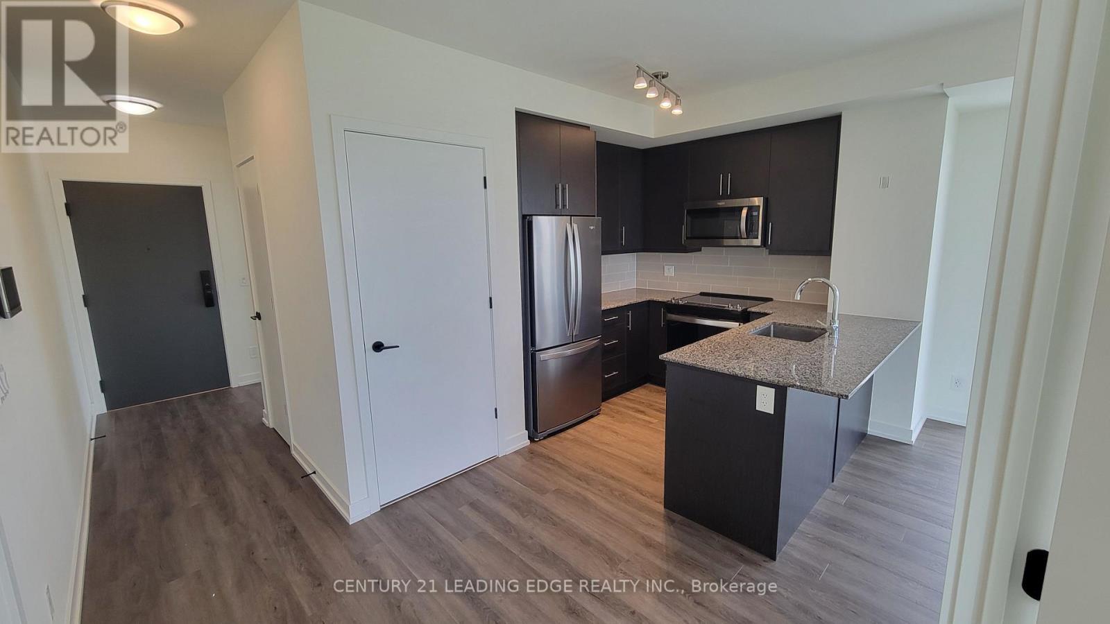 1003 - 345 Wheat Boom Drive, Oakville, Ontario  L6H 7X4 - Photo 3 - W13024520