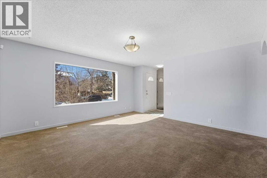 716 Whitemont Drive Ne, Calgary, Alberta  T1Y 2Z8 - Photo 5 - A2298581