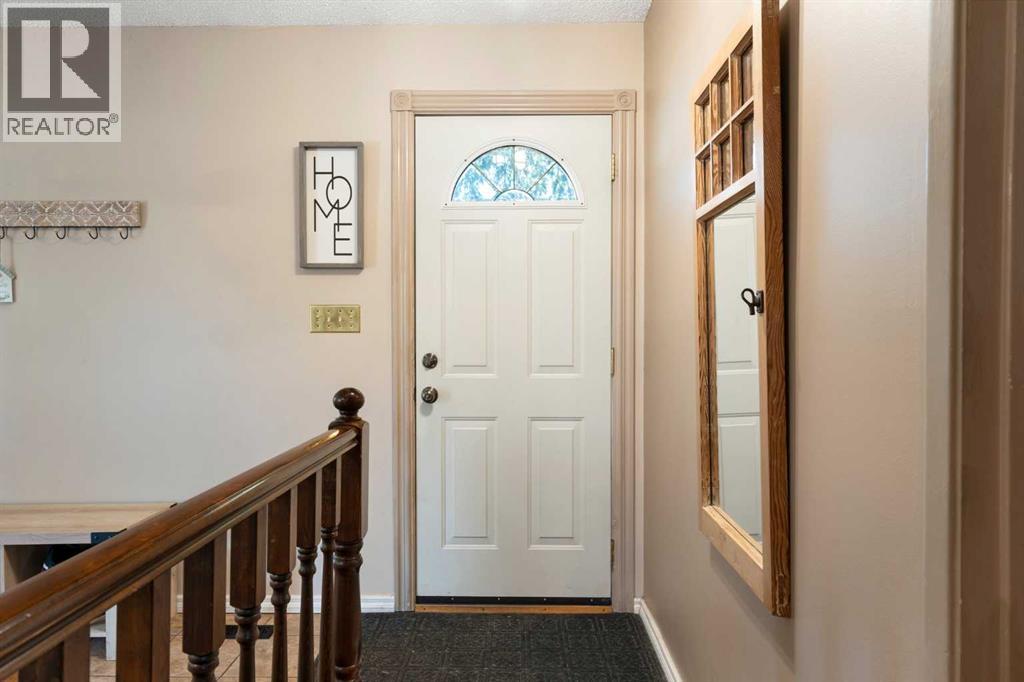 4609 Marcombe Way Ne, Calgary, Alberta  T2A 3G6 - Photo 4 - A2303431