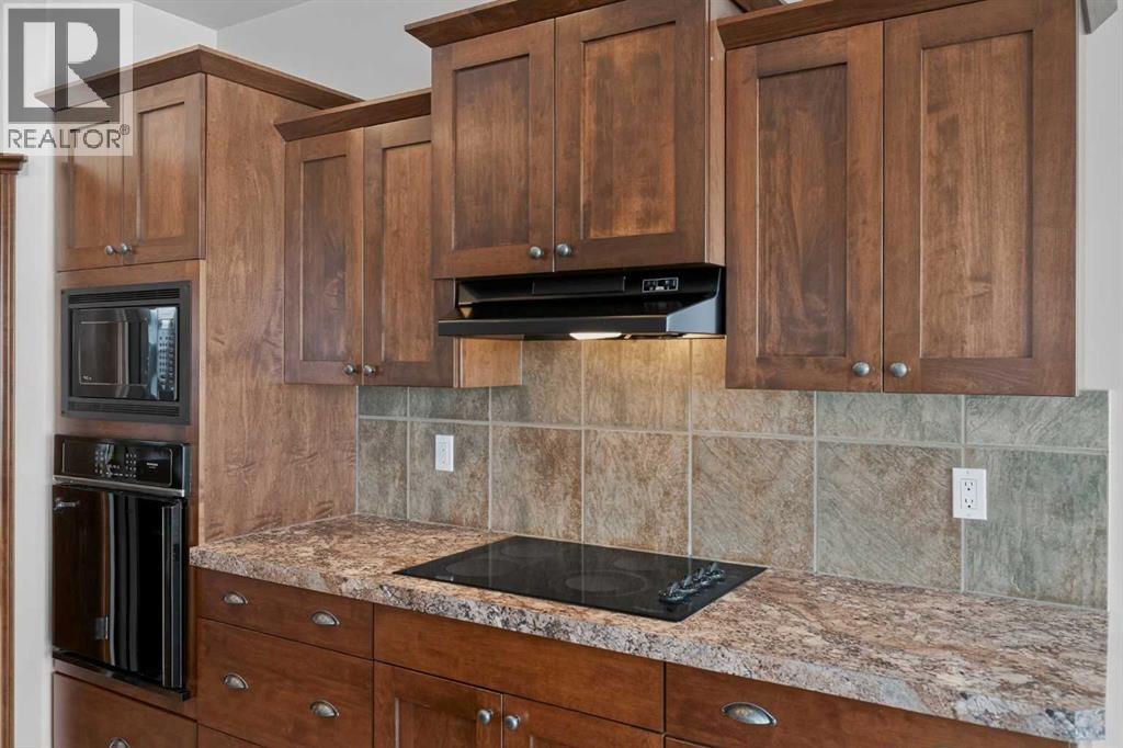 70 Panatella Circle Nw, Calgary, Alberta  T3K 5Z7 - Photo 7 - A2301330