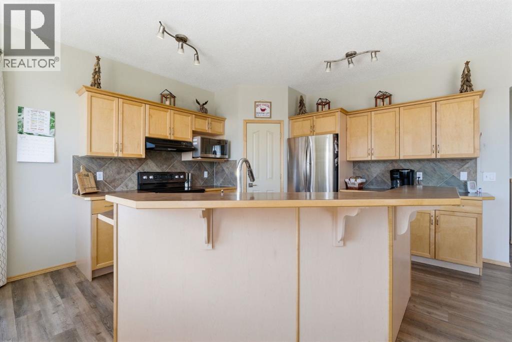 159 Milligan Drive, Okotoks, Alberta  T1S 1N2 - Photo 2 - A2302254