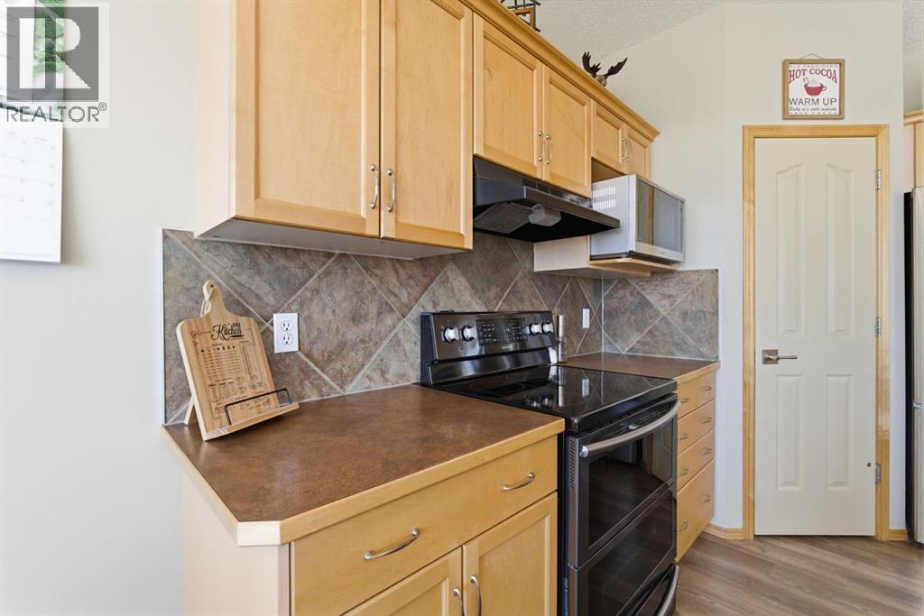 159 Milligan Drive, Okotoks, Alberta  T1S 1N2 - Photo 4 - A2302254