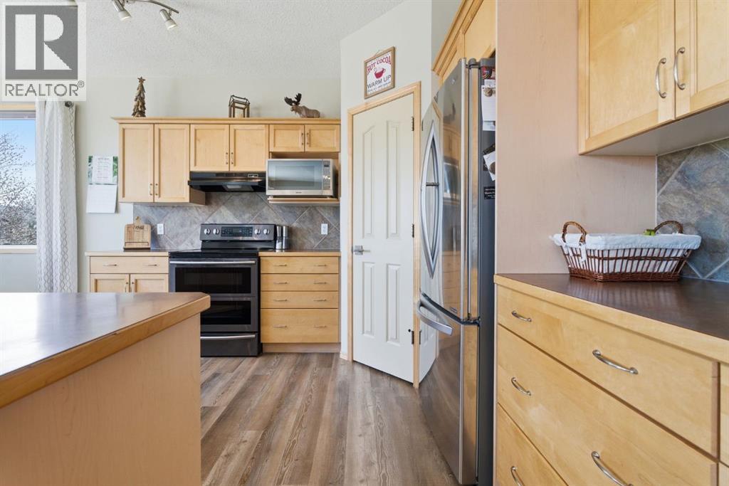 159 Milligan Drive, Okotoks, Alberta  T1S 1N2 - Photo 6 - A2302254