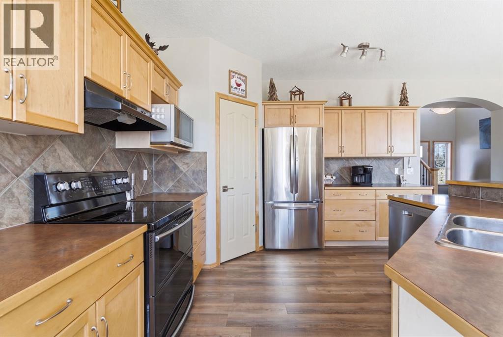 159 Milligan Drive, Okotoks, Alberta  T1S 1N2 - Photo 5 - A2302254