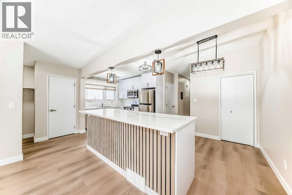 7406-7408 Hunterfield Road Nw, Calgary, Alberta  T2K 4L1 - Photo 3 - A2276447