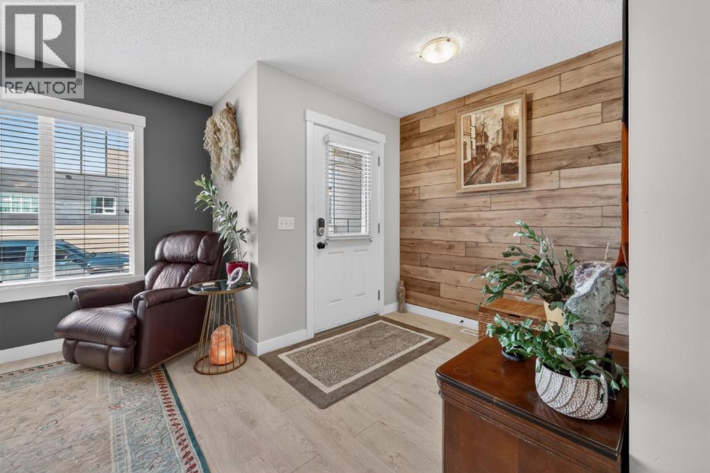 203 Fireside Parkway, Cochrane, Alberta  T4C 0V8 - Photo 2 - A2296249