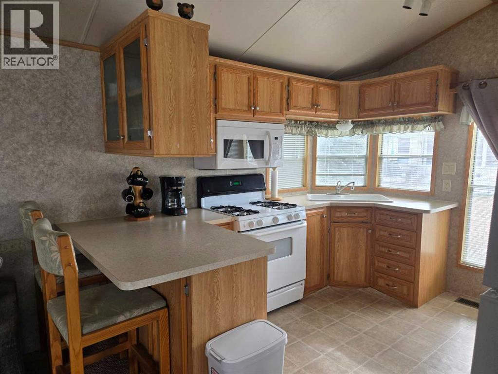 481 Carefree Resort, Rural Red Deer County, Alberta  T4G 0K6 - Photo 5 - A2303208