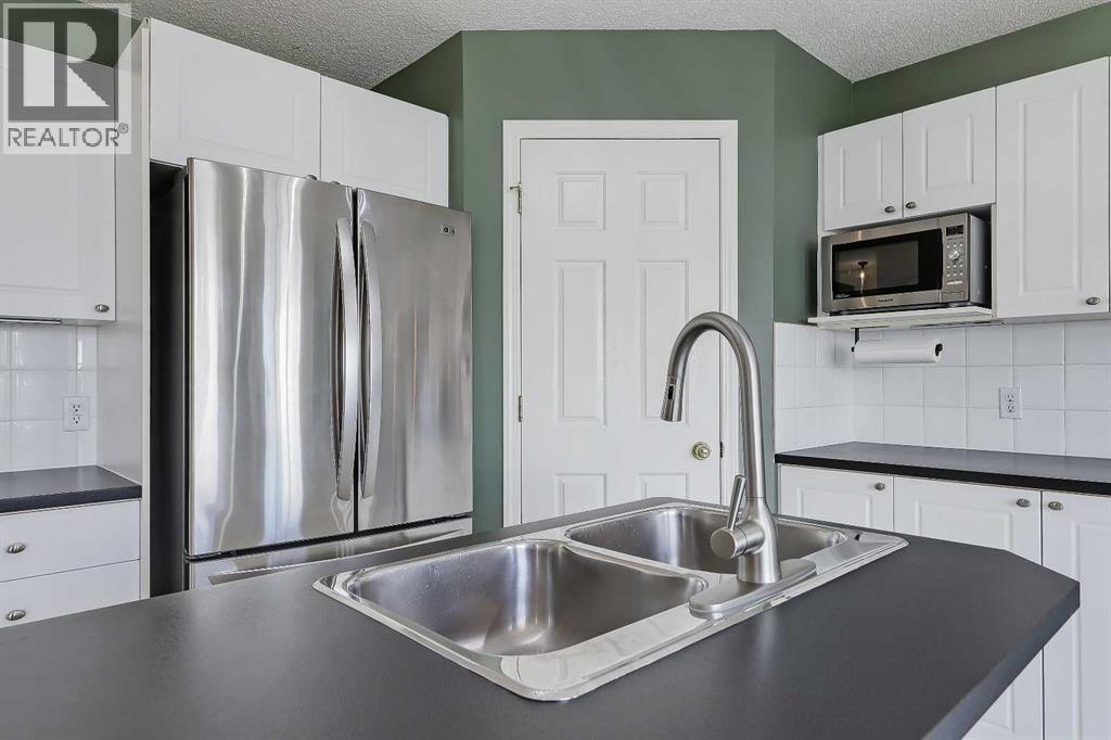 123 Arbour Butte Road NW, Calgary, Alberta  T3G 4L9 - Photo 5 - A2294478