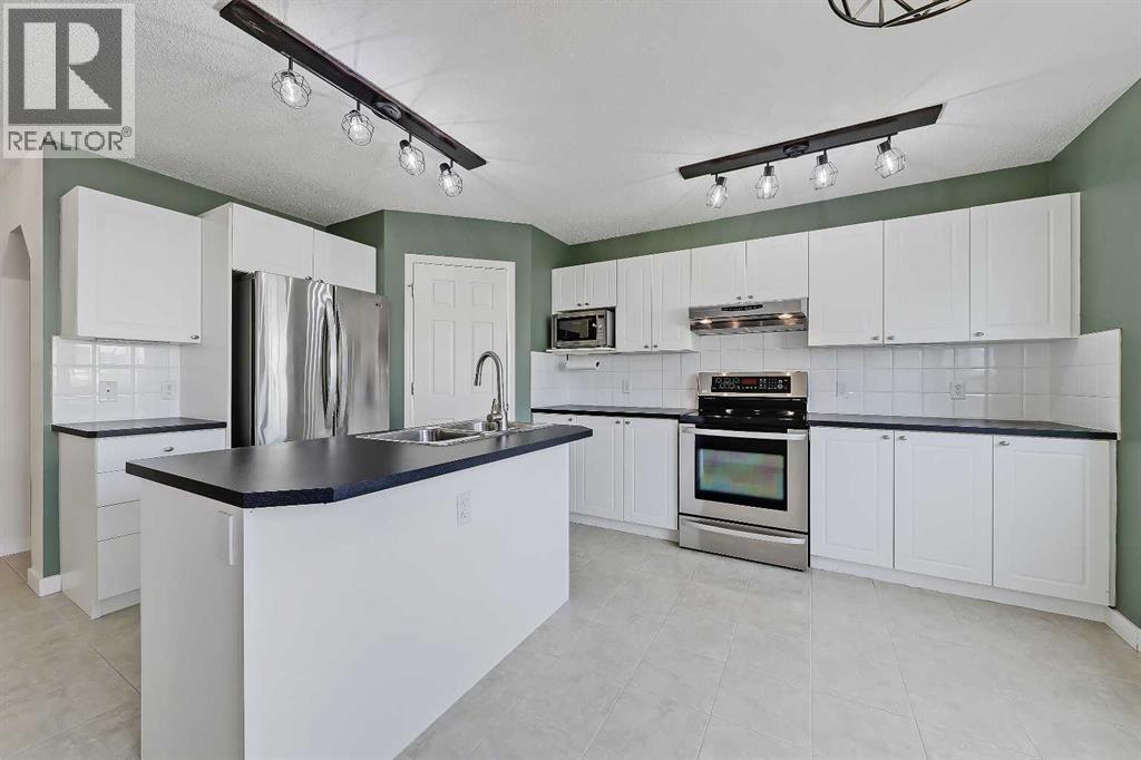 123 Arbour Butte Road NW, Calgary, Alberta  T3G 4L9 - Photo 3 - A2294478