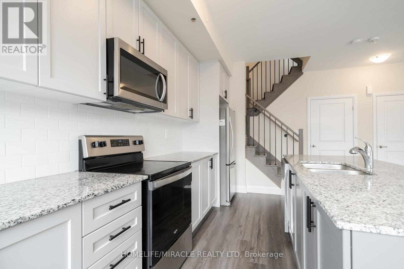 #104 - 1593 Rose Way, Milton, Ontario  L9E 0J2 - Photo 7 - W12968204