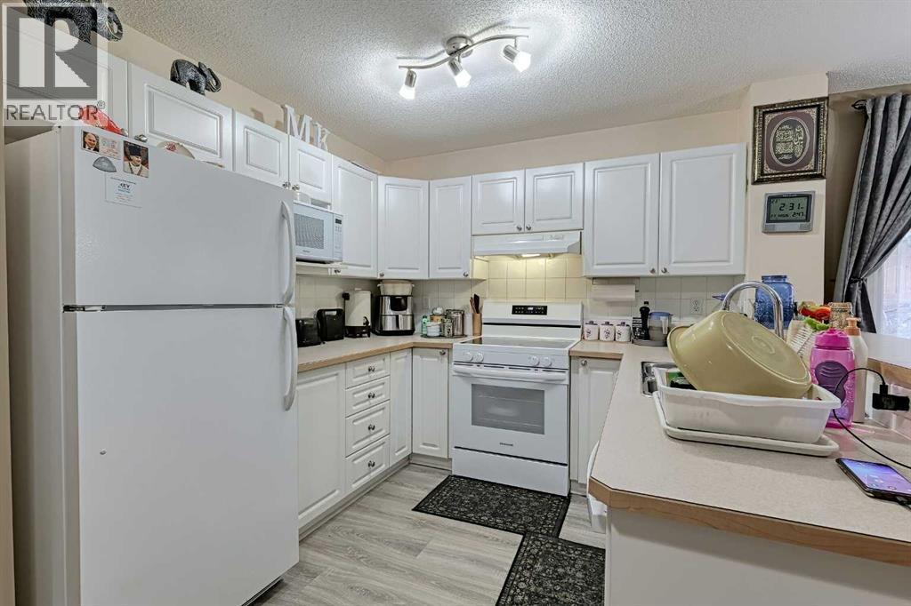 501 Coral Cove NE, Calgary, Alberta  T3J 3Y9 - Photo 10 - A2280990