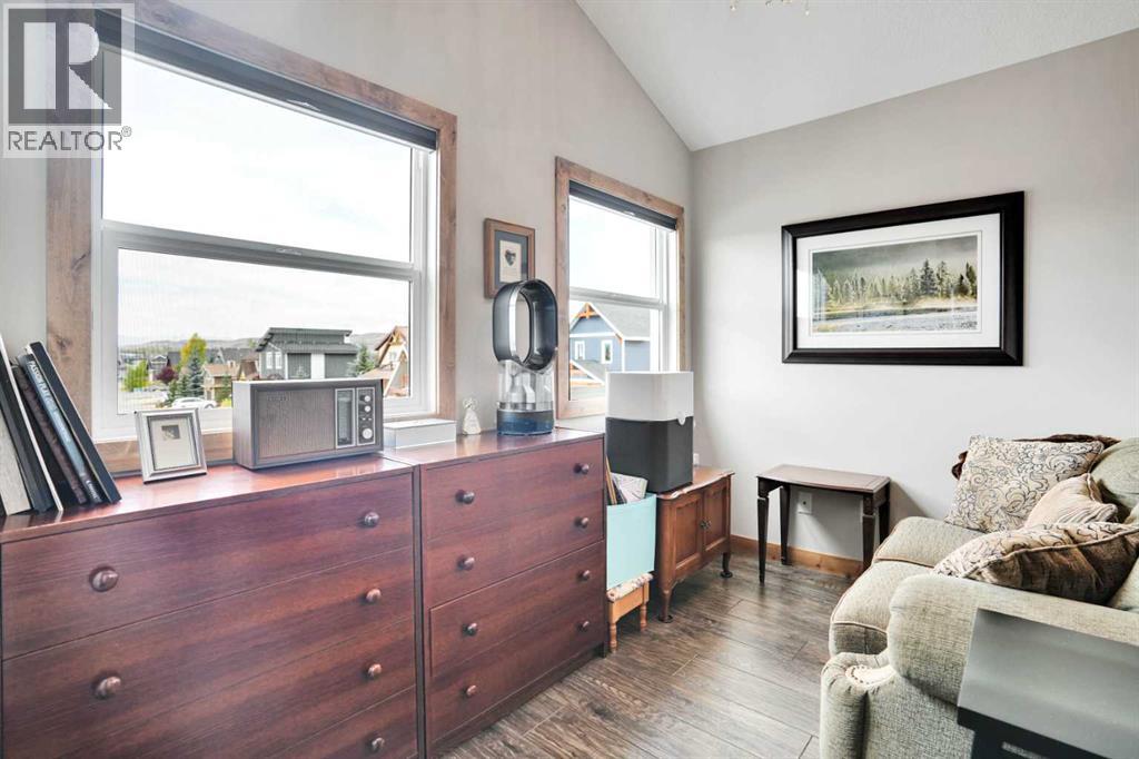 210 Cottageclub Crescent, Rural Rocky View County, Alberta  T4C 1B1 - Photo 18 - A2291756