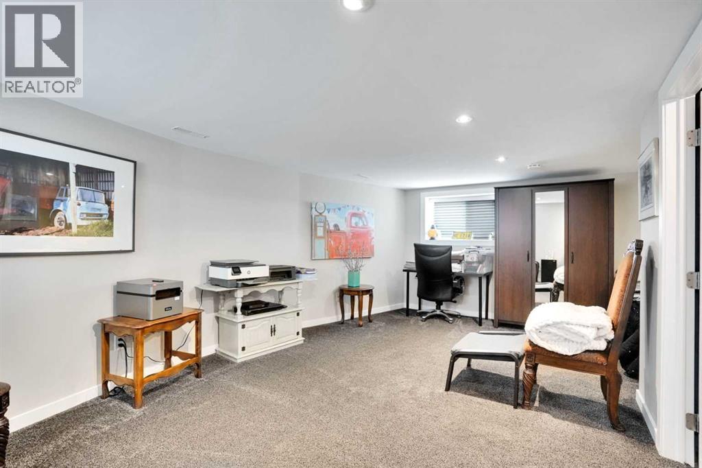 210 Cottageclub Crescent, Rural Rocky View County, Alberta  T4C 1B1 - Photo 20 - A2291756