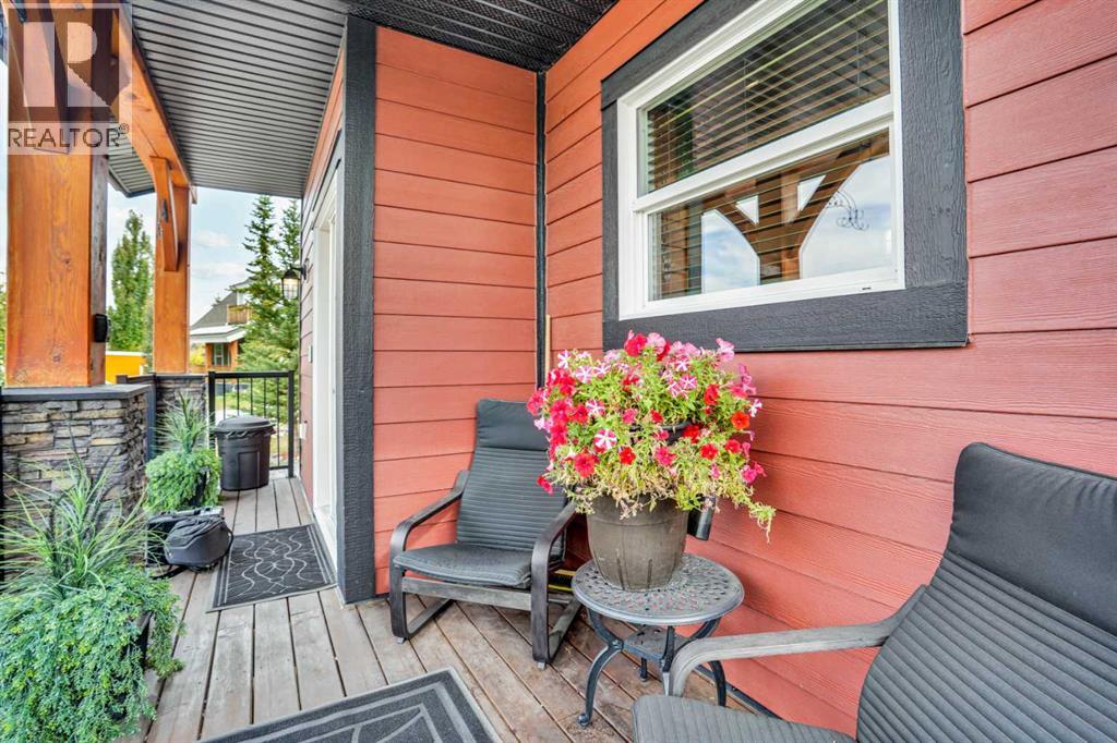 210 Cottageclub Crescent, Rural Rocky View County, Alberta  T4C 1B1 - Photo 2 - A2291756