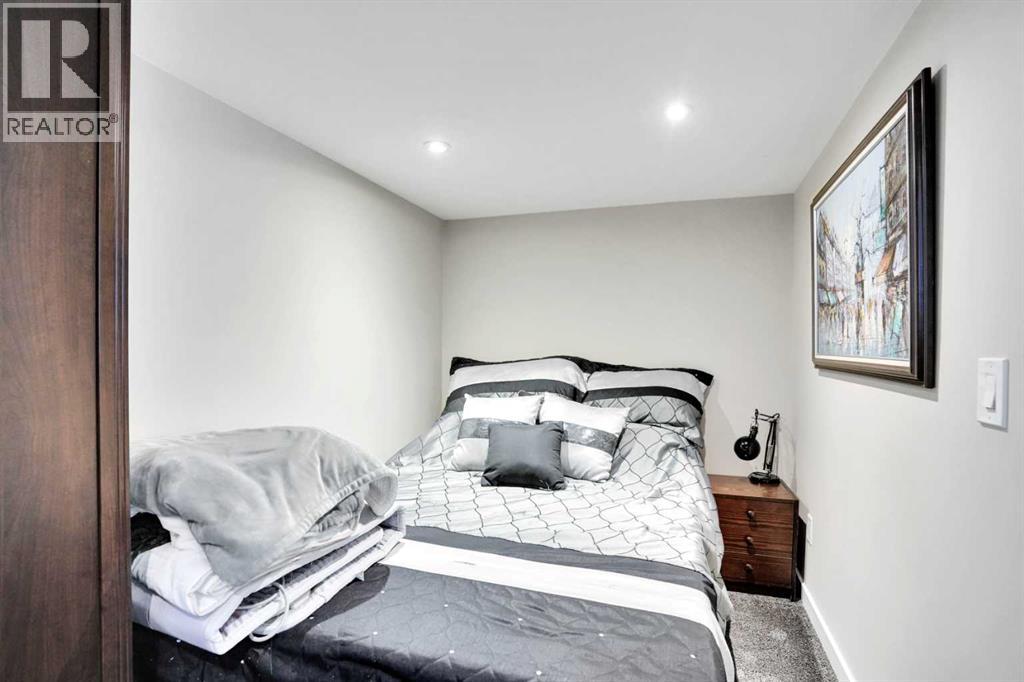 210 Cottageclub Crescent, Rural Rocky View County, Alberta  T4C 1B1 - Photo 21 - A2291756