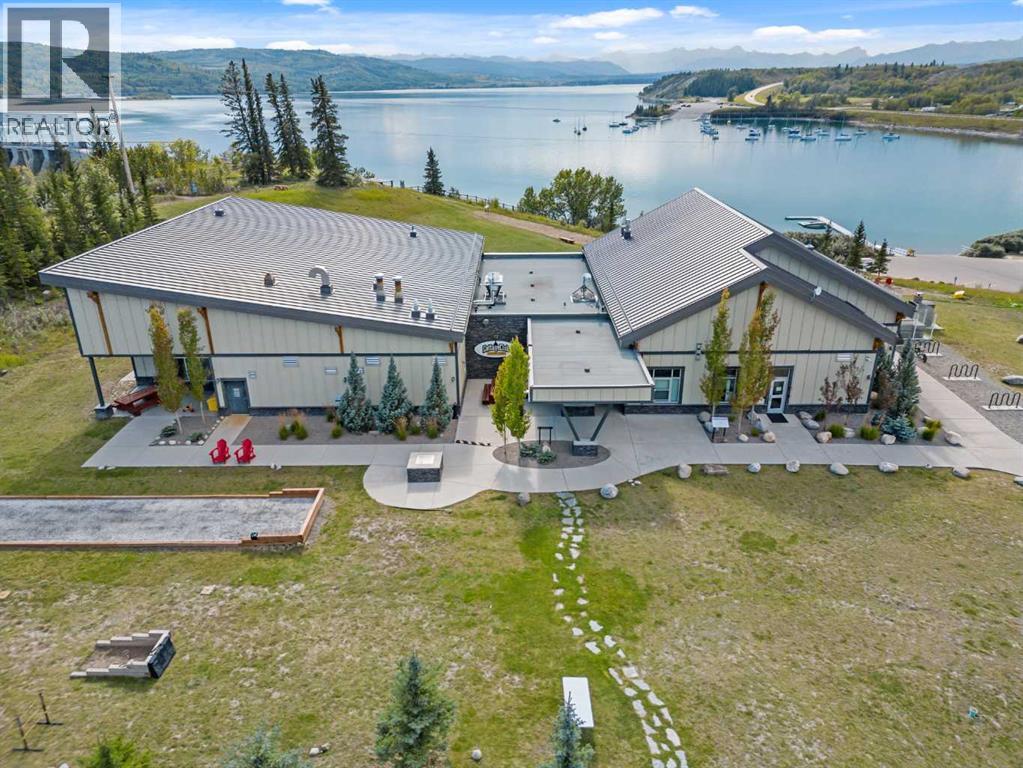 210 Cottageclub Crescent, Rural Rocky View County, Alberta  T4C 1B1 - Photo 34 - A2291756