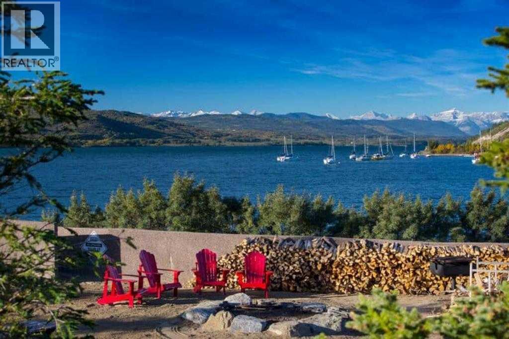 210 Cottageclub Crescent, Rural Rocky View County, Alberta  T4C 1B1 - Photo 45 - A2291756