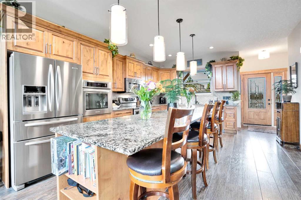 210 Cottageclub Crescent, Rural Rocky View County, Alberta  T4C 1B1 - Photo 6 - A2291756