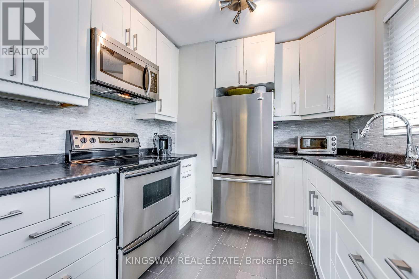 Main - 408 Lanor Avenue, Toronto, Ontario  M8W 2R6 - Photo 6 - W13025750