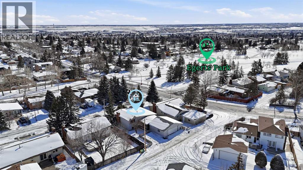 107 Nottingham Road, Calgary, Alberta  T2K 5R2 - Photo 3 - A2301234