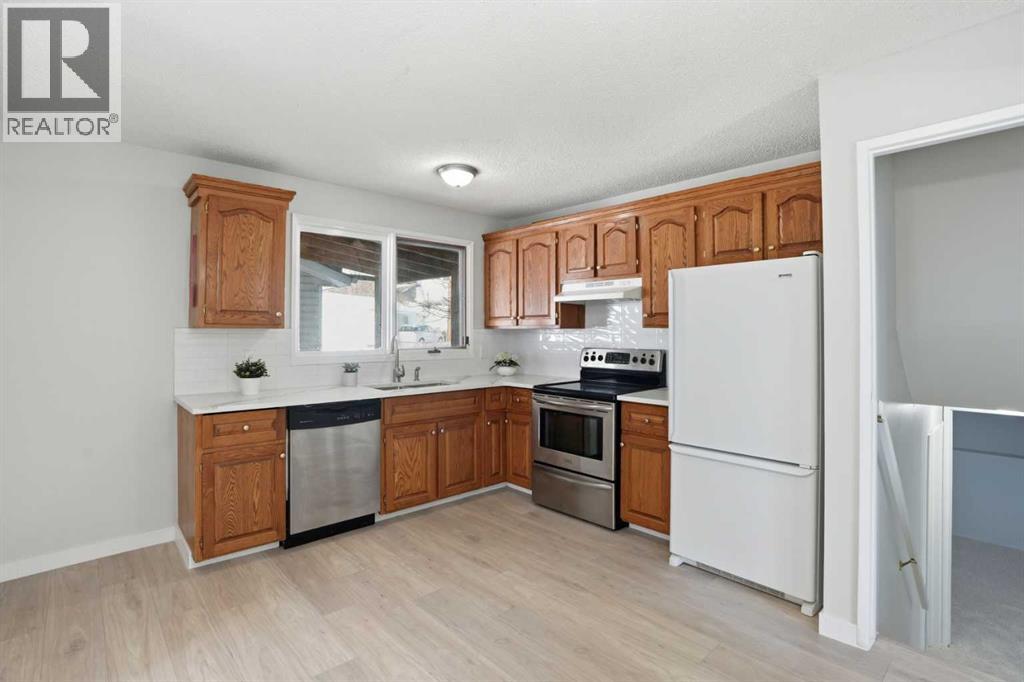 107 Nottingham Road, Calgary, Alberta  T2K 5R2 - Photo 11 - A2301234