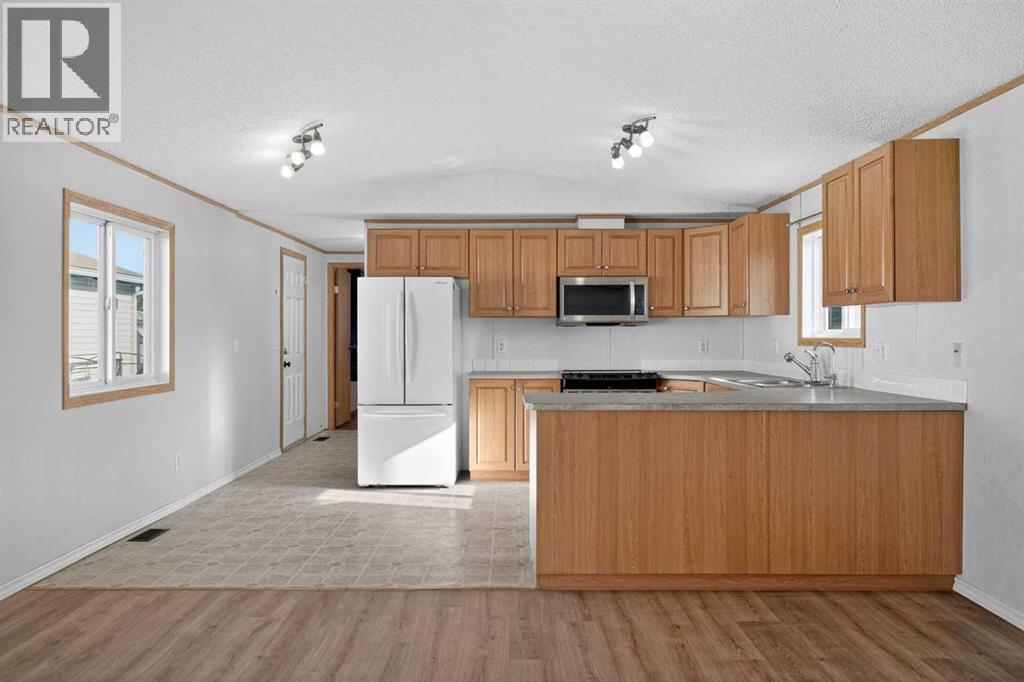 125 Erin Woods Circle Se, Calgary, Alberta  T2B 3E1 - Photo 4 - A2299827