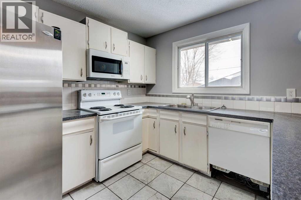1071 Maitland Drive NE, Calgary, Alberta  T2A 5K1 - Photo 6 - A2301895