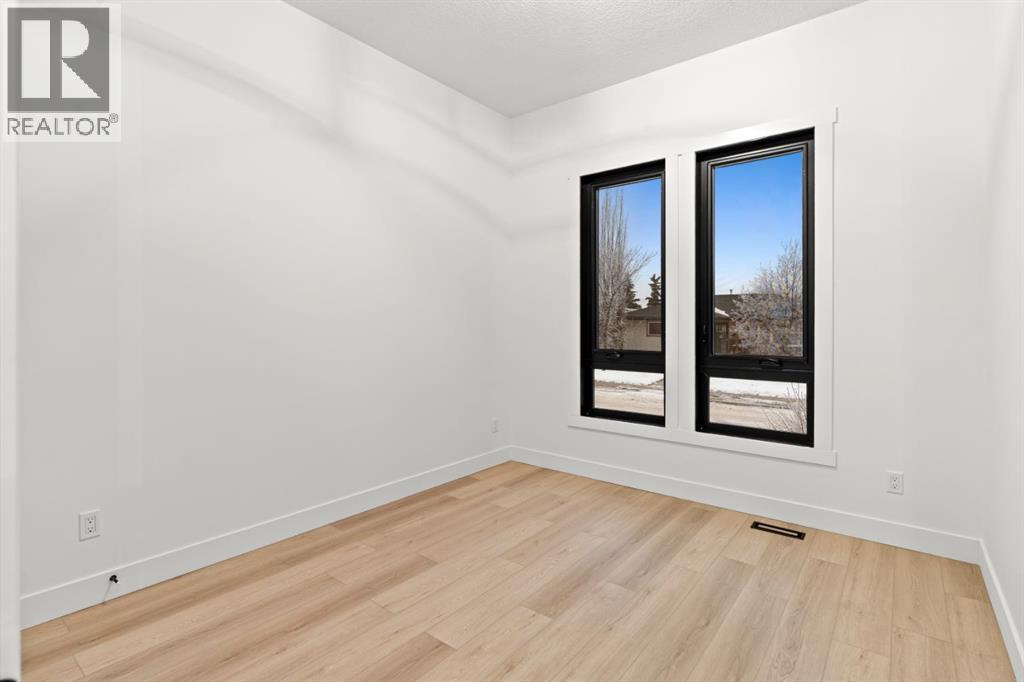 27 Glacier Drive SW, Calgary, Alberta  T3E 5A2 - Photo 22 - A2276893