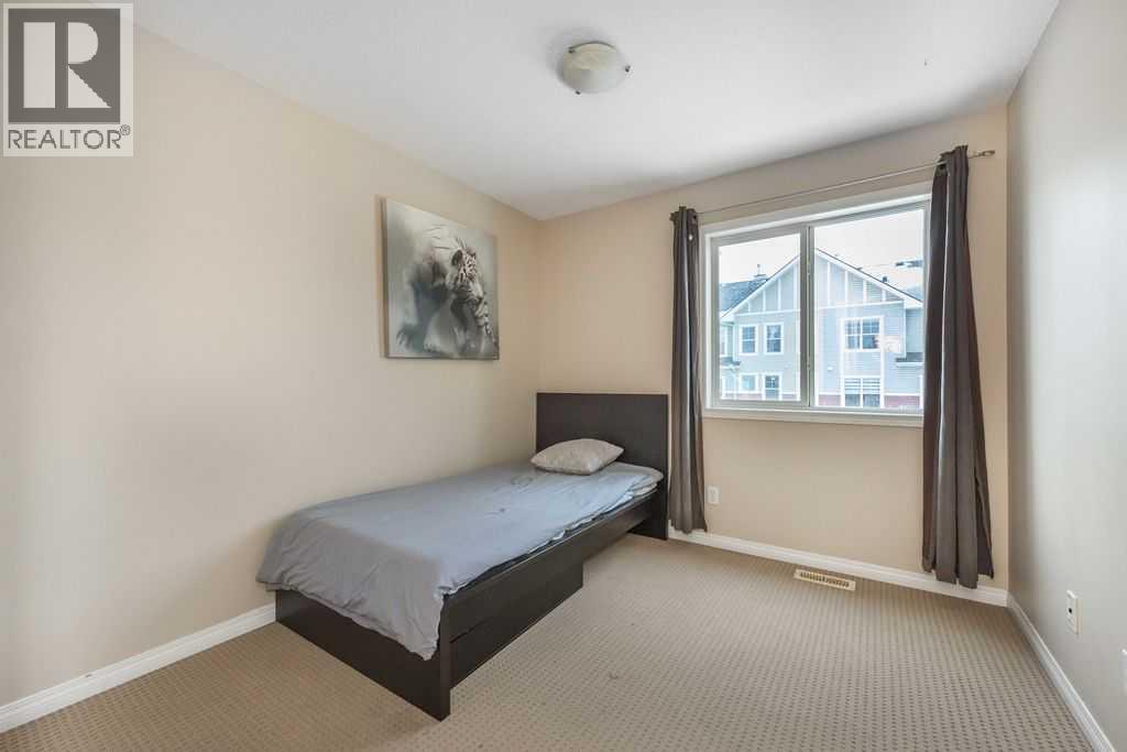 1005 New Brighton Gardens Se, Calgary, Alberta  T2Z 0Y1 - Photo 15 - A2296095