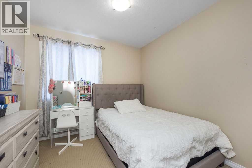 1005 New Brighton Gardens Se, Calgary, Alberta  T2Z 0Y1 - Photo 17 - A2296095