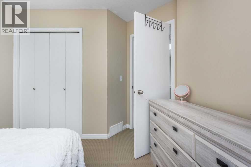 1005 New Brighton Gardens Se, Calgary, Alberta  T2Z 0Y1 - Photo 19 - A2296095