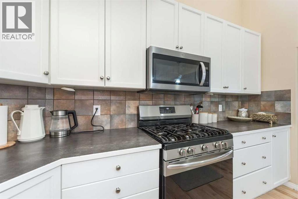 1005 New Brighton Gardens Se, Calgary, Alberta  T2Z 0Y1 - Photo 8 - A2296095