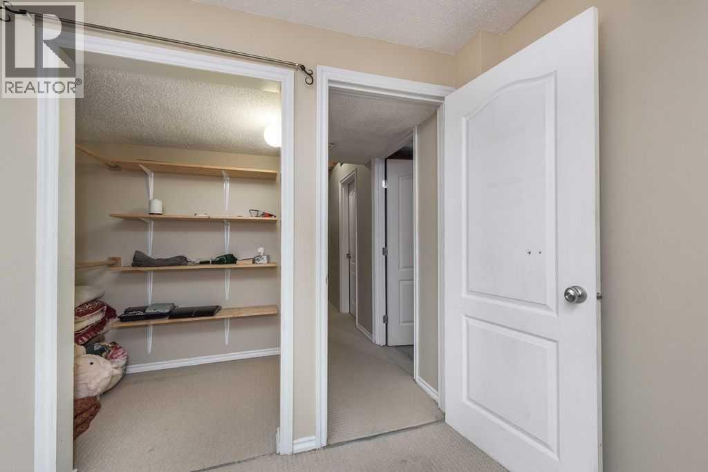 1005 New Brighton Gardens Se, Calgary, Alberta  T2Z 0Y1 - Photo 25 - A2296095