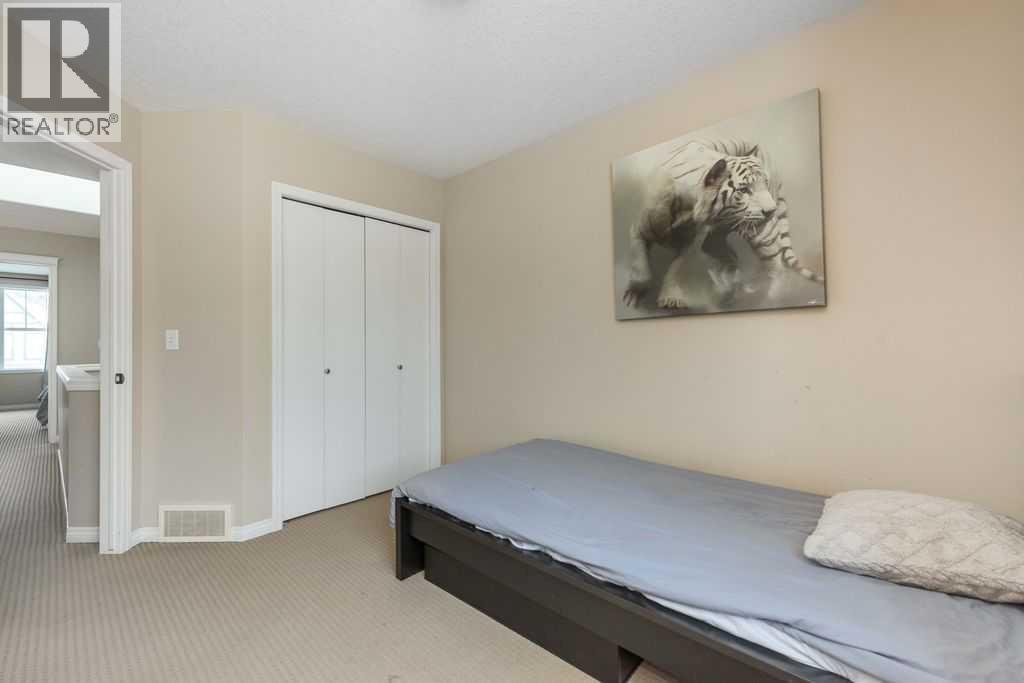 1005 New Brighton Gardens Se, Calgary, Alberta  T2Z 0Y1 - Photo 16 - A2296095