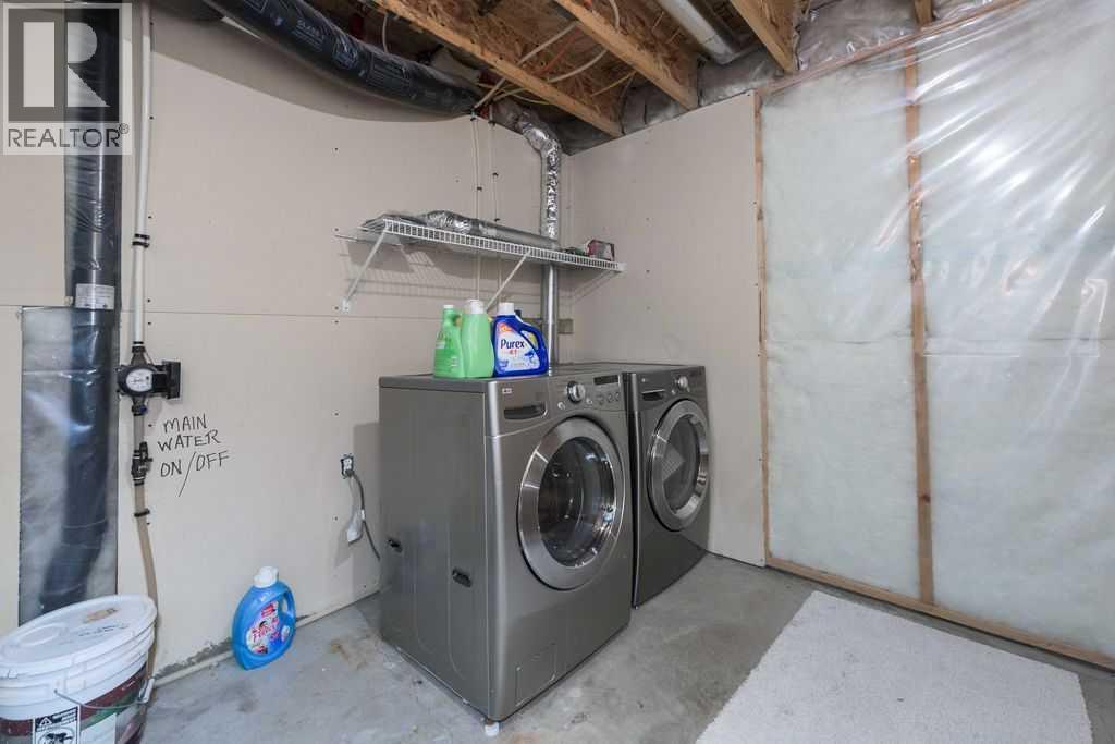 1005 New Brighton Gardens Se, Calgary, Alberta  T2Z 0Y1 - Photo 26 - A2296095