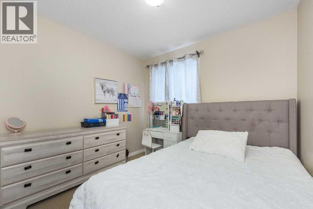 1005 New Brighton Gardens Se, Calgary, Alberta  T2Z 0Y1 - Photo 18 - A2296095