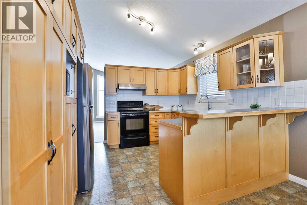 15 Cowichan Court W, Lethbridge, Alberta  T1K 7M9 - Photo 7 - A2302573