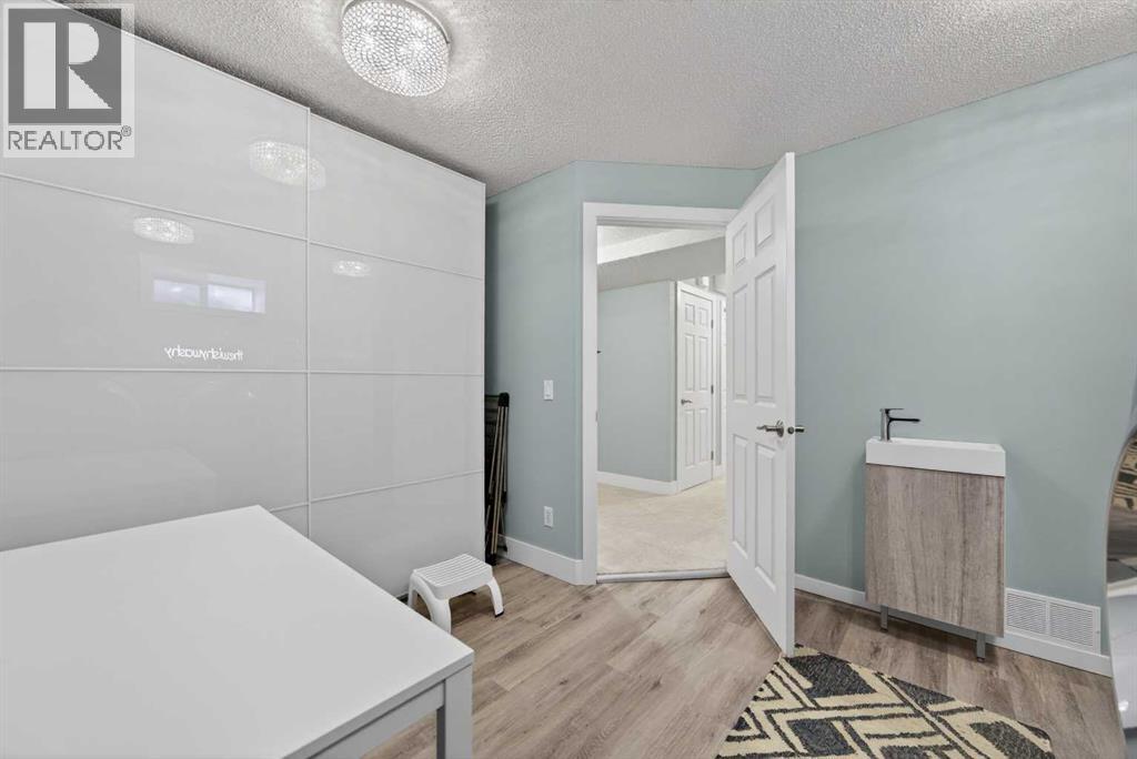 348 Woodside Circle Nw, Airdrie, Alberta  T4B 2J8 - Photo 39 - A2302549