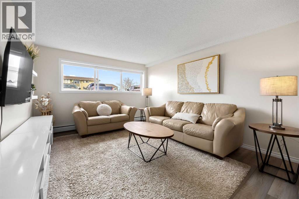 215, 101 Big Hill Way Se, Airdrie, Alberta  T4A 1Z7 - Photo 2 - A2300921