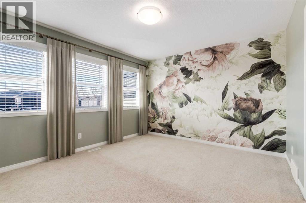 730 Belmont Drive SW, Calgary, Alberta  T2X 4H3 - Photo 19 - A2286204